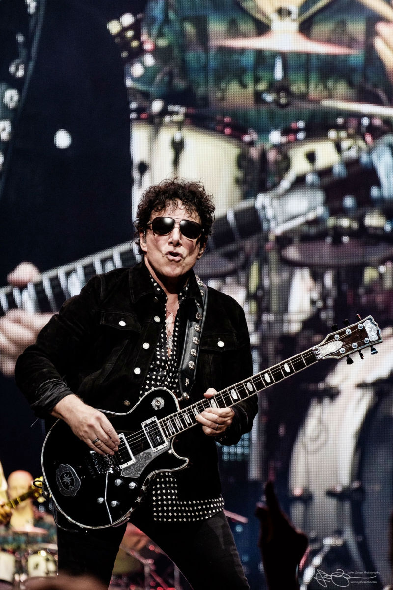 Neal Schon Plays Guitar against the white Drumset on Tour with Def Lepard and Journey 2018
