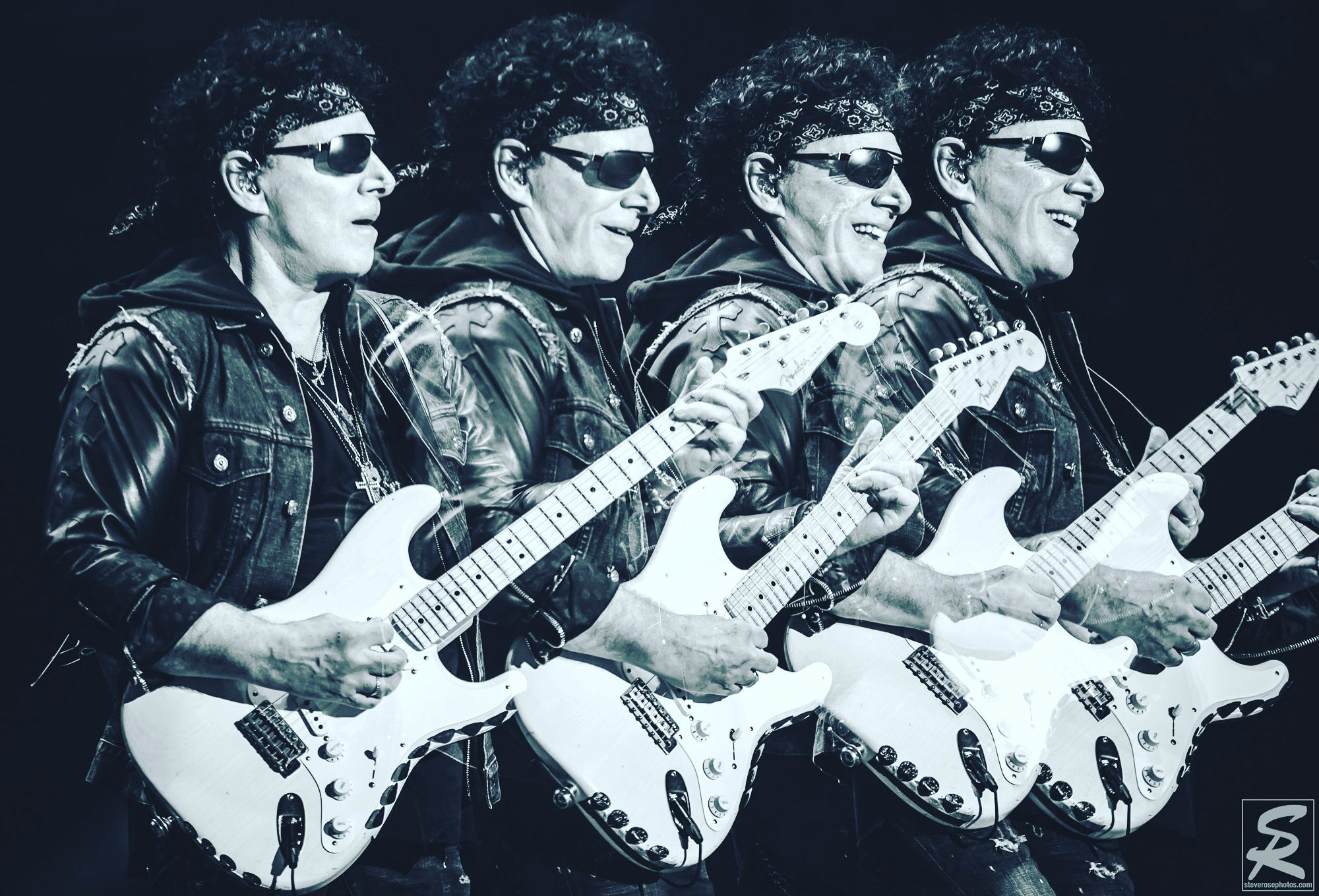 Quad Neal Schon playing white hot guitar licks